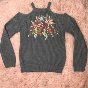 Gray cold shoulder floral sweater.
